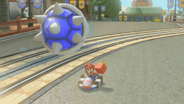 esquivar un caparazón de pinchos azul en Mario Kart 8 Deluxe