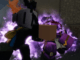Roblox Jojo Shenanigans a avatar wearing a silver helemt standing next to star platinum stand both encased in purple aura