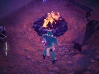 Player beside a campfire in Fornite.